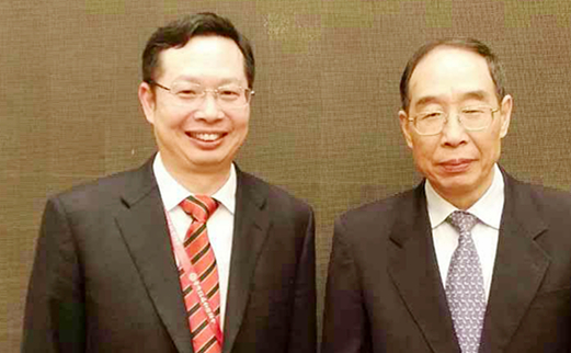 2014年5月福建省委书记尤权与牛八体育集团董事长苏庆灿亲切合影